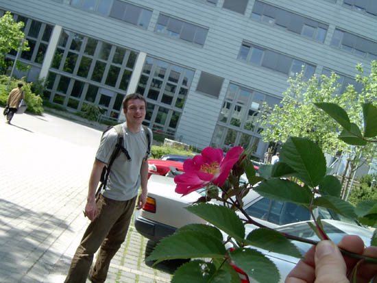 Piotr smelling the flower 